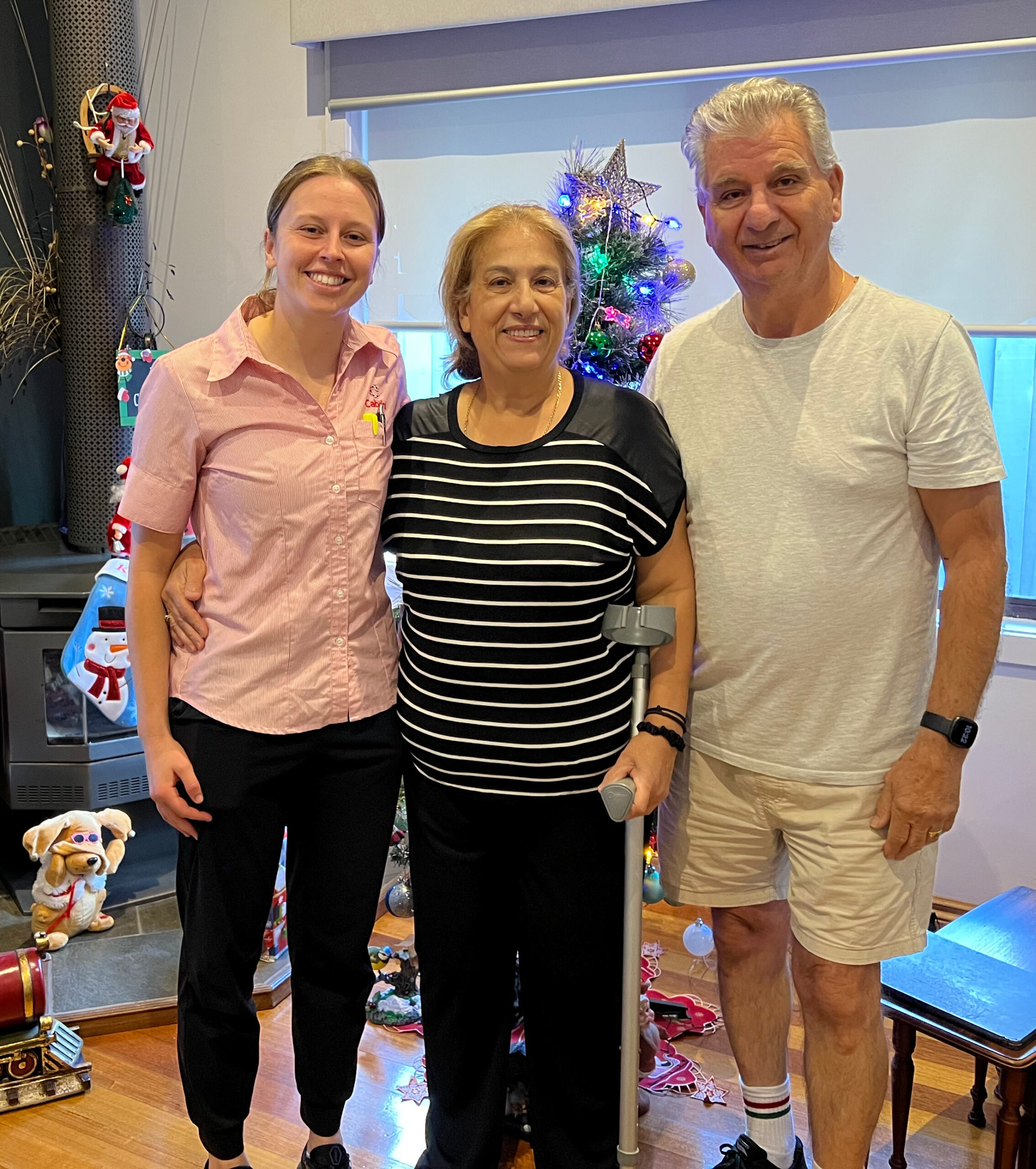 Cabrini 'At Home' care physio with patient and her husband