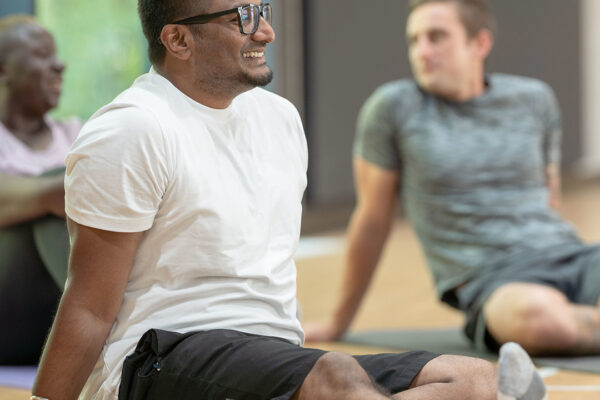 Guys on a yoga mat