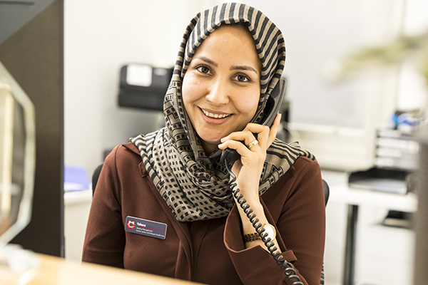 Cabrini Outreach staff member on the phone