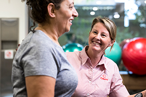 Cardiac patient doing rehabilitation exercises with a Cabrini staff member