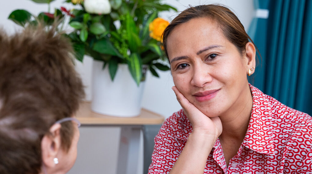 Cabrini nurse listening to a patient talking