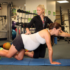 Pregnant lady doing stretches